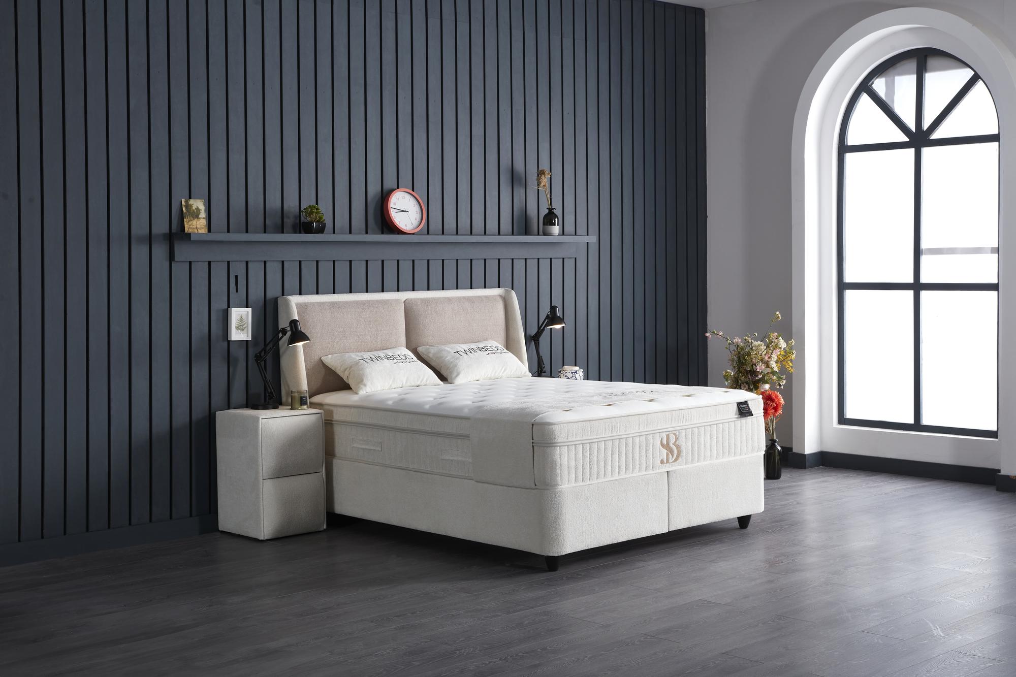 Boxspringbett 'TwinBedd' von SkyHome24.de mit integriertem Stauraum und Matratze, ideal für komfortablen Schlaf und funktionale Raumnutzung.