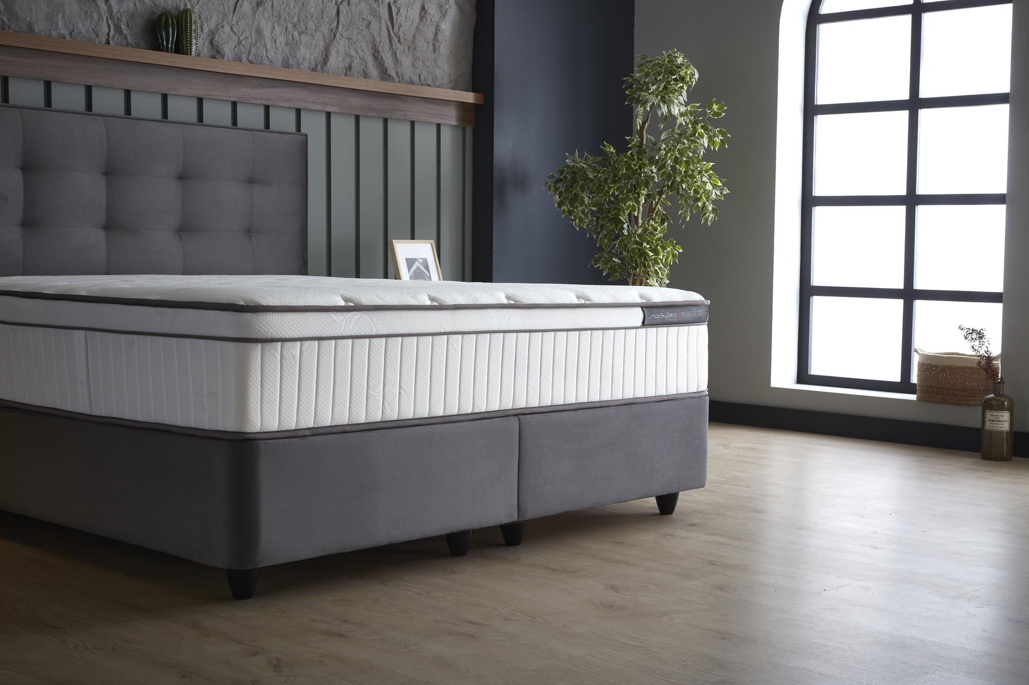 Boxspringbett 'ModeBedd' SkyBedd mit ergonomischer Matratze und integriertem Stauraum, im modernen Design mit Coil Pro Balance Spring Technology für optimalen Komfort.