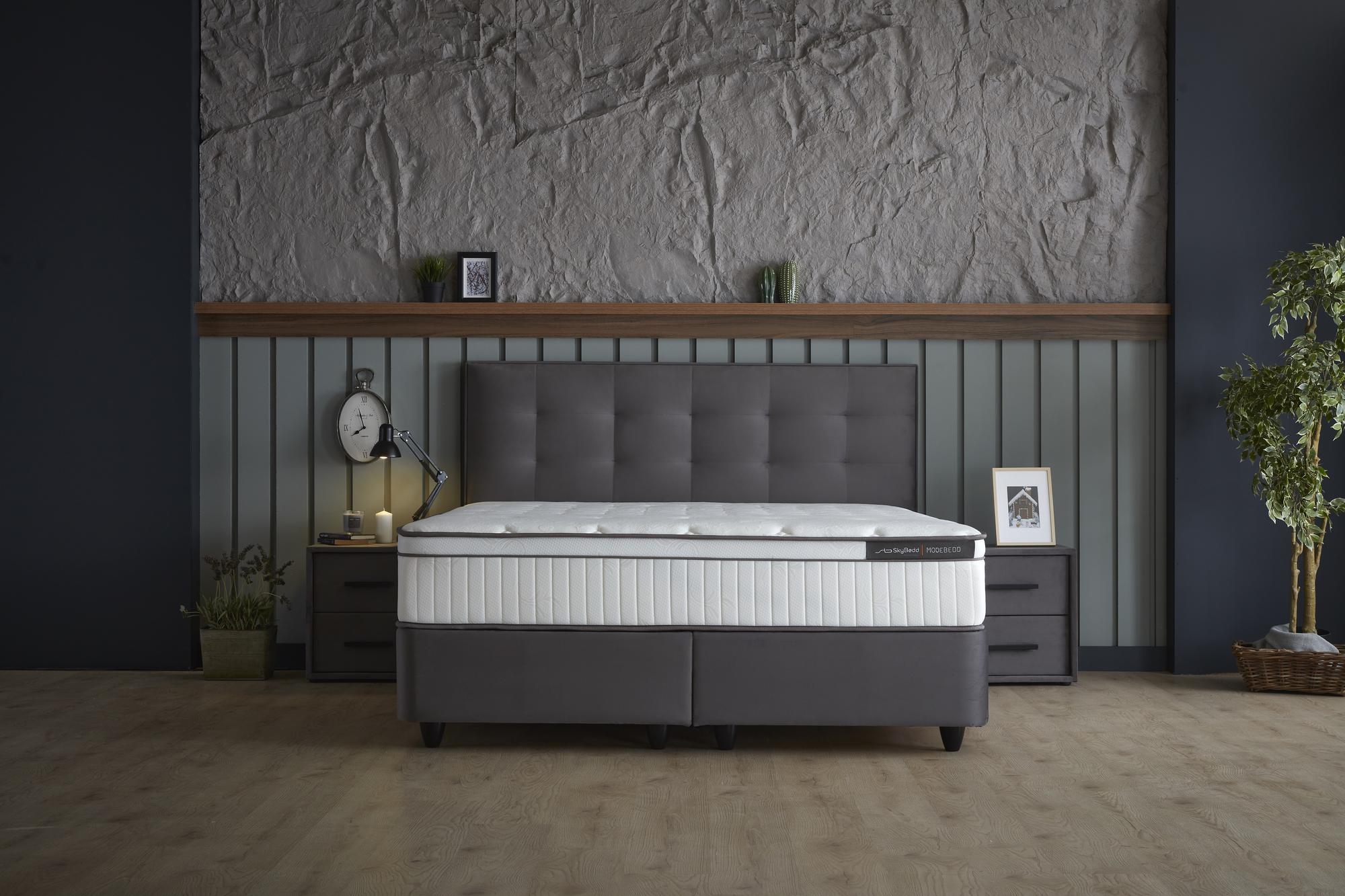 Boxspringbett 'ModeBedd' SkyBedd mit ergonomischer Matratze und integriertem Stauraum, ideal für stressbedingte Müdigkeit, im modernen Design für dein Schlafzimmer.