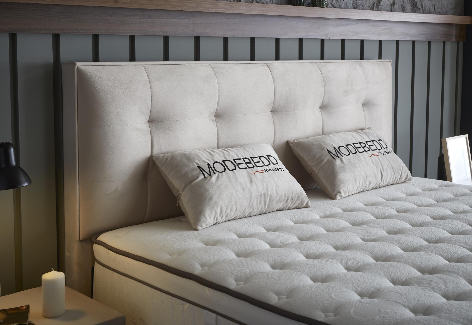 Boxspringbett 'ModeBedd' SkyBedd mit ergonomischer Matratze und integriertem Stauraum, kombiniert Coil Pro Balance Spring Technology mit Softschaum für optimalen Schlafkomfort.