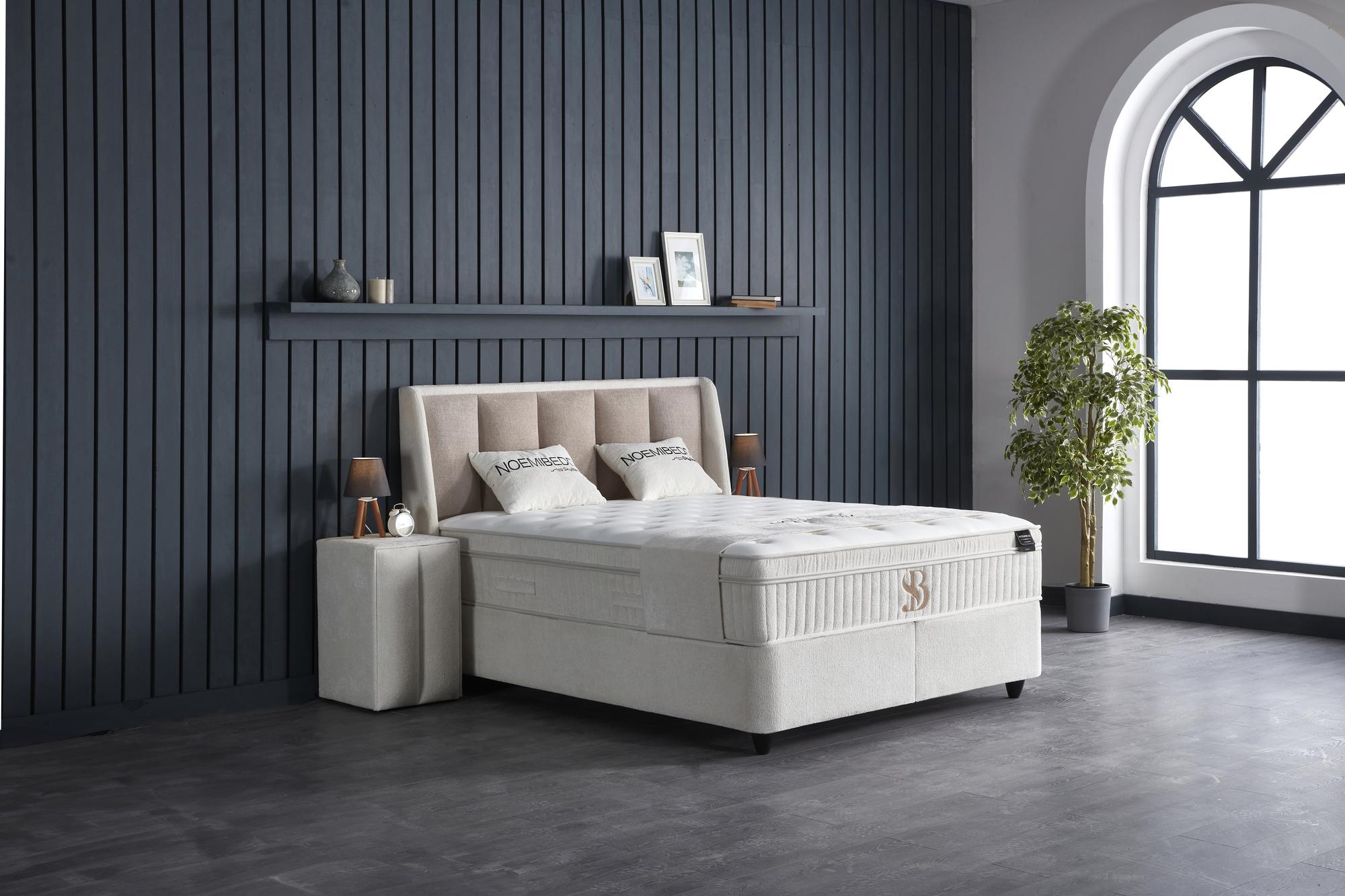 Boxspringbett NoemiBedd von SkyHome24.de mit integrierter Matratze und Stauraum, besticht durch modernes, funktionales Design, ideal für einen harmonischen Schlaf.