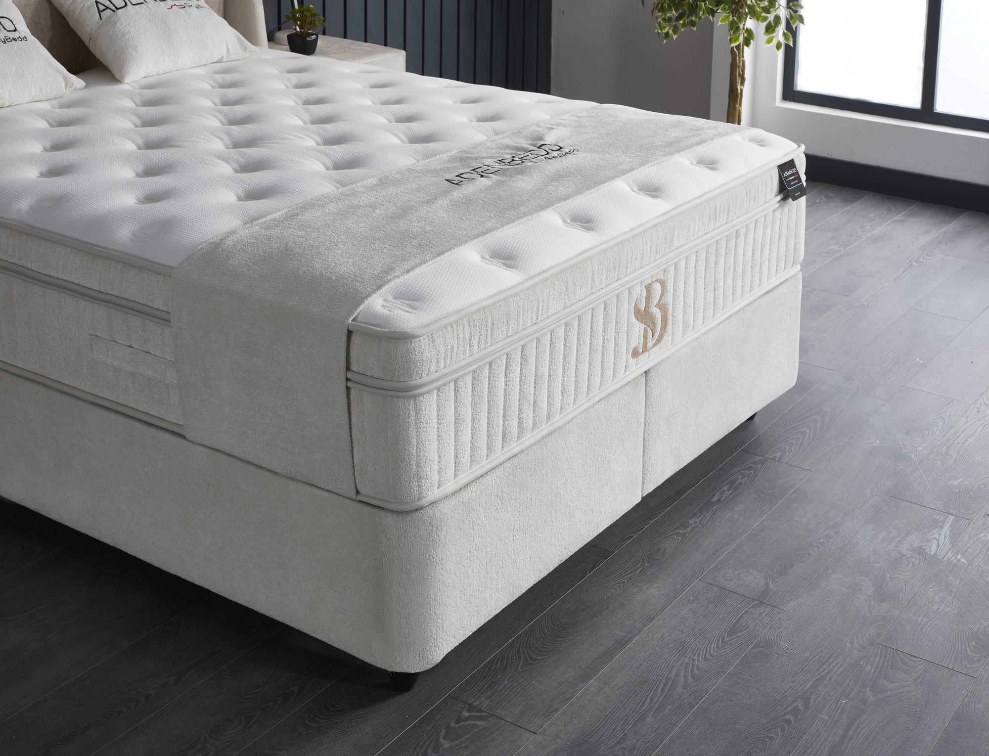 Boxspringbett 'AdenBedd' SkyBedd mit Matratze und integriertem Stauraum, Nahaufnahme von Kissen und Futonpad, erhältlich bei SkyHome24.de, bekannt für günstige Preise.
